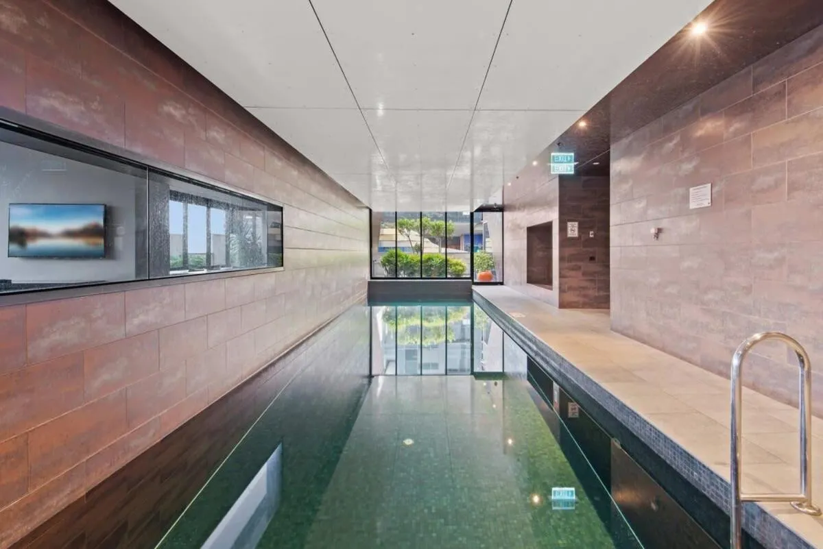 Image 3 of Modern 1-Bed City Apartment with Pool and Gym