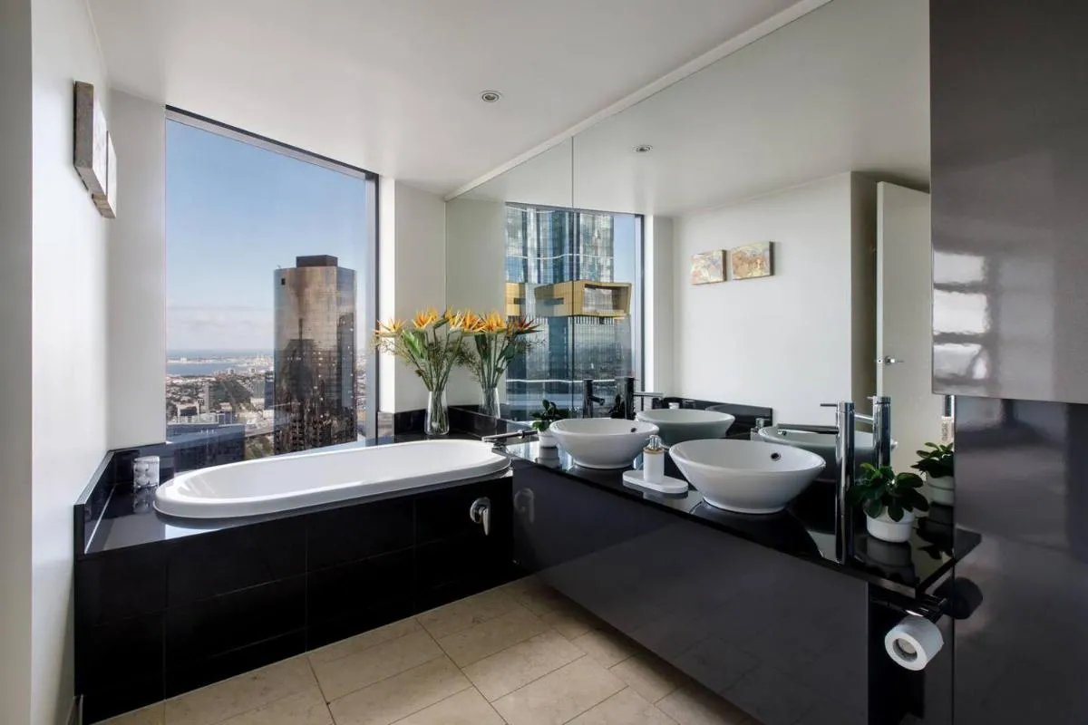 Image 2 of Modern meets Retro in Penthouse with Soaring Views