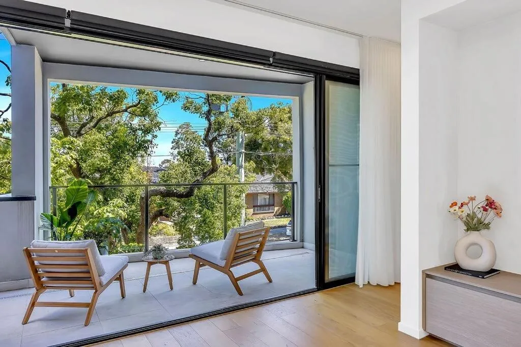 Image of Stylish Three-Story Getaway with Balcony – Clayton